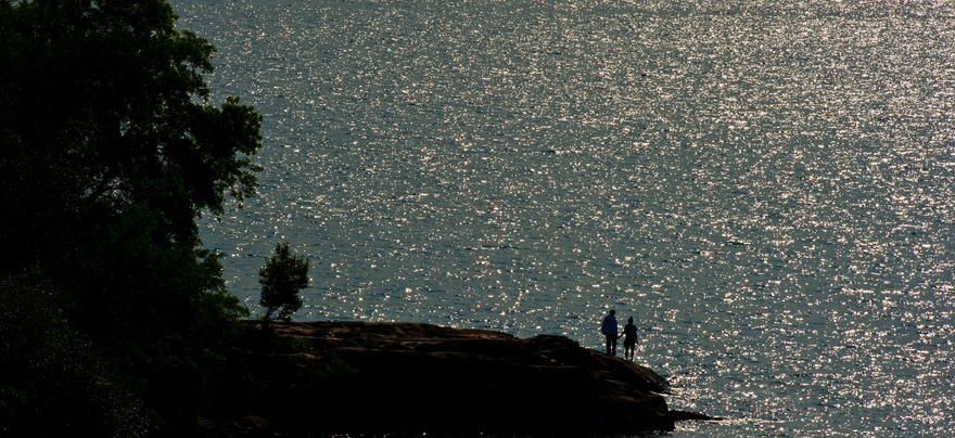 People standing near shore